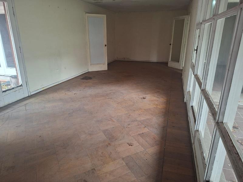 Gran Terreno de 611 m² en Barrio Simón Bolívar, Ñuñoa | Sólida Casa Familiar con Enorme Potencial